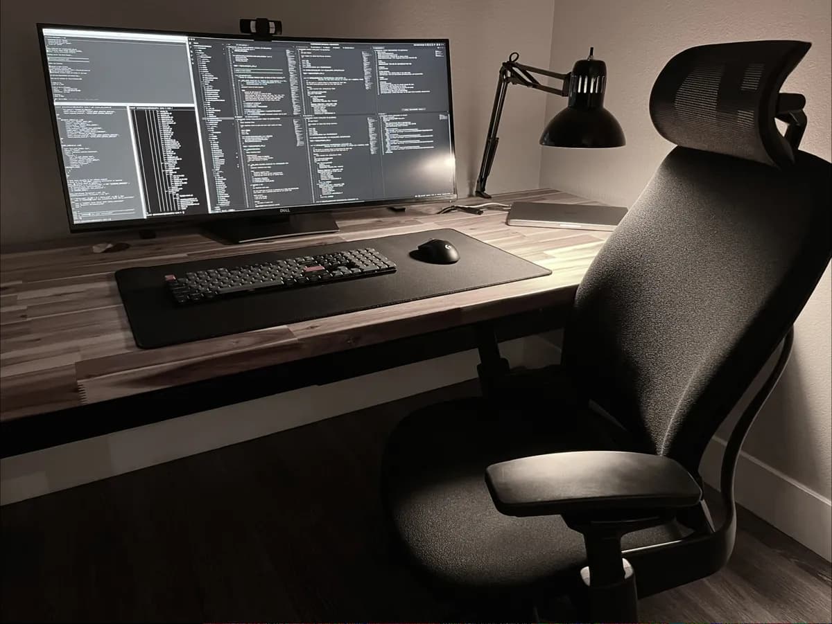 Minimalist desk setup with ultrawide monitor